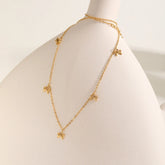 collier pendentif nœud plaquée or