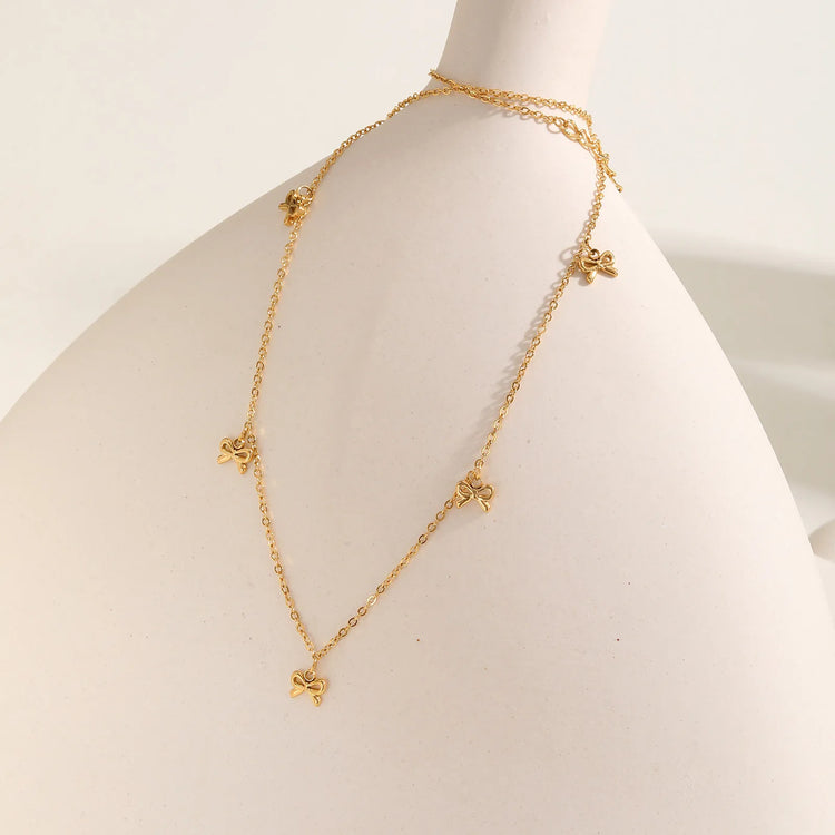 collier pendentif nœud plaquée or