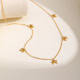 collier pendentif nœud plaquée or