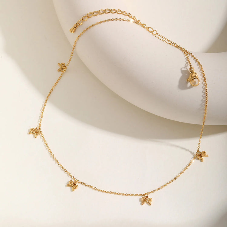 collier pendentif nœud plaquée or
