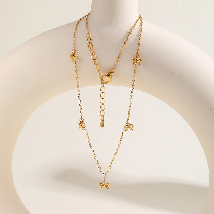 collier pendentif nœud plaquée or